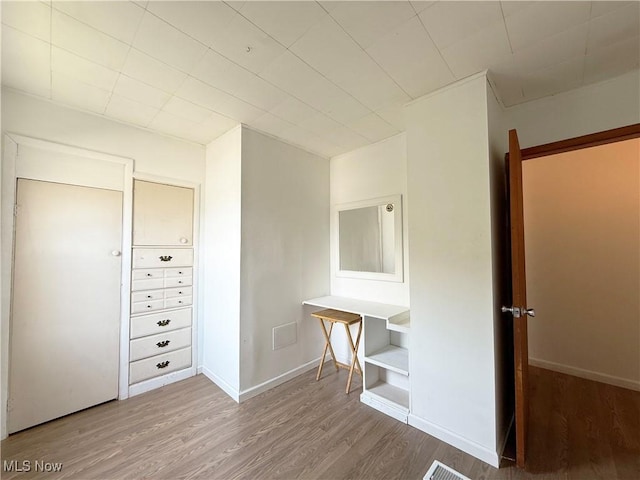 5048 Grove Ave, Lorain, OH 44055 - empty room with wood finished floors and baseboards
