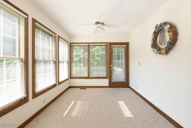 215 Bailey Ct, Doylestown, OH 44230 - unfurnished sunroom with carpet flooring