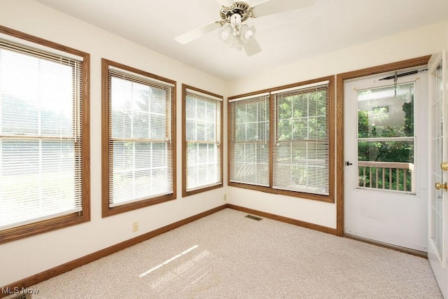 215 Bailey Ct, Doylestown, OH 44230 - unfurnished sunroom featuring carpet flooring and baseboards