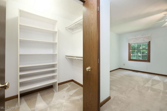 215 Bailey Ct, Doylestown, OH 44230 - spacious closet featuring carpet and ceiling fan