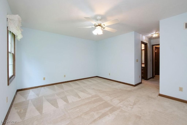 215 Bailey Ct, Doylestown, OH 44230 - unfurnished room with light colored carpet and ceiling fan