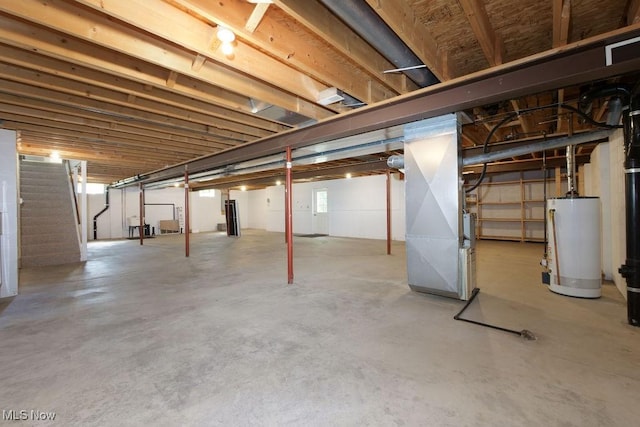 215 Bailey Ct, Doylestown, OH 44230 - basement with stairway, gas water heater, and heating unit