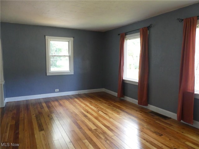 6069 Hyde St, Mentor, OH 44060 - unfurnished room featuring hardwood / wood-style flooring and baseboards