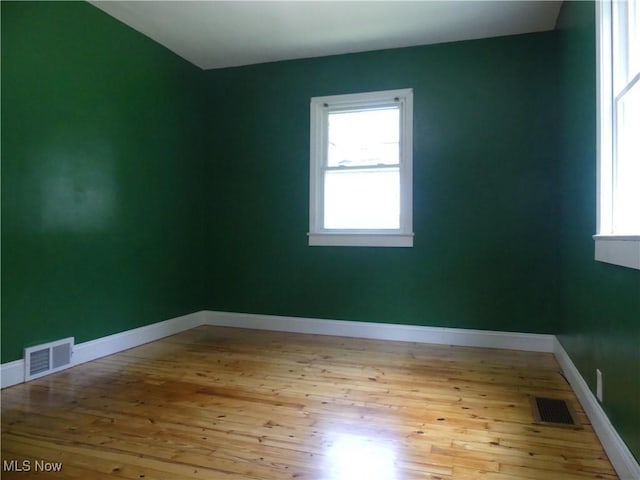 6069 Hyde St, Mentor, OH 44060 - spare room featuring light wood-style flooring and baseboards