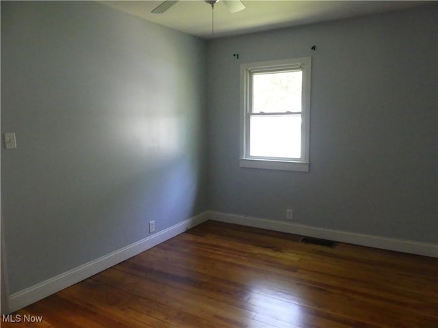 6069 Hyde St, Mentor, OH 44060 - unfurnished room with dark wood-type flooring and ceiling fan