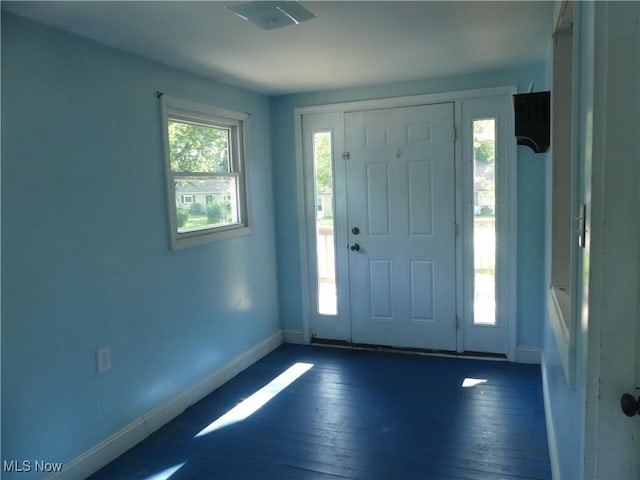6069 Hyde St, Mentor, OH 44060 - entryway with baseboards and hardwood / wood-style floors