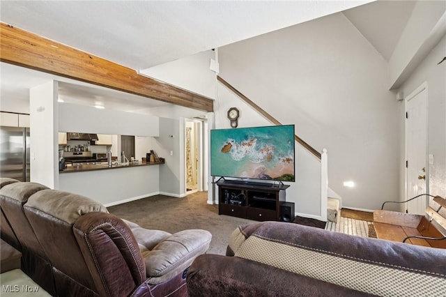 8080 Harbor Crk Unit 503, Mentor On The Lake, OH 44060 - living room featuring dark colored carpet, stairs, and lofted ceiling