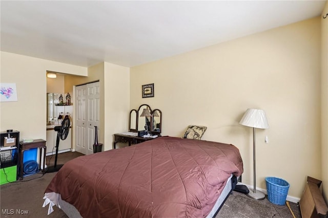 8080 Harbor Crk Unit 503, Mentor On The Lake, OH 44060 - carpeted bedroom featuring a closet and baseboards