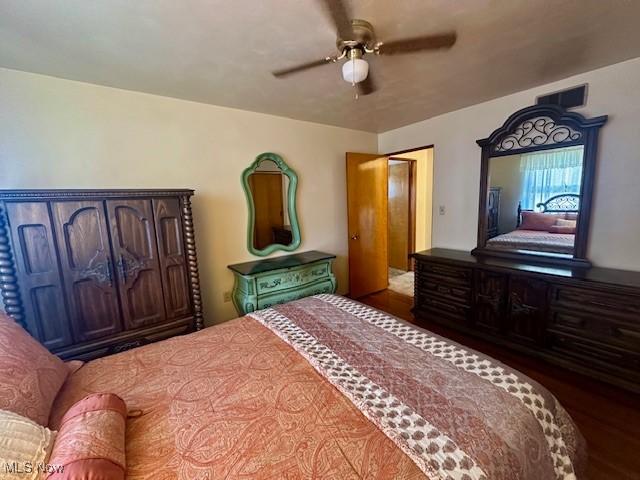 211 Donnell St, Weirton, WV 26062 - bedroom with wood finished floors and a ceiling fan