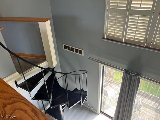 2157 Penguin Ave, Akron, OH 44319 - stairway featuring wood finished floors and baseboards
