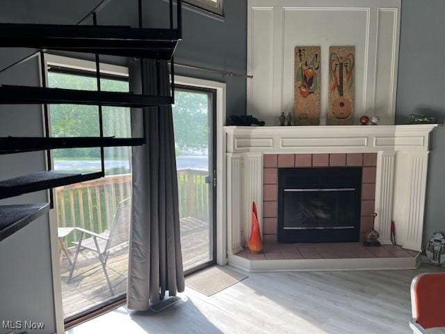 2157 Penguin Ave, Akron, OH 44319 - living room featuring a fireplace and wood finished floors