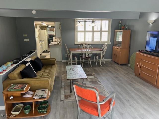 2157 Penguin Ave, Akron, OH 44319 - living room with wood finished floors and baseboards