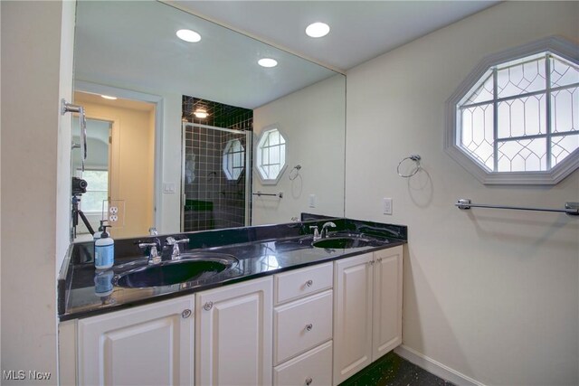 181 Seminary St, Berea, OH 44017 - full bath featuring double vanity, a stall shower, and recessed lighting