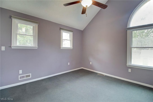 181 Seminary St, Berea, OH 44017 - spare room featuring ceiling fan, dark colored carpet, and lofted ceiling