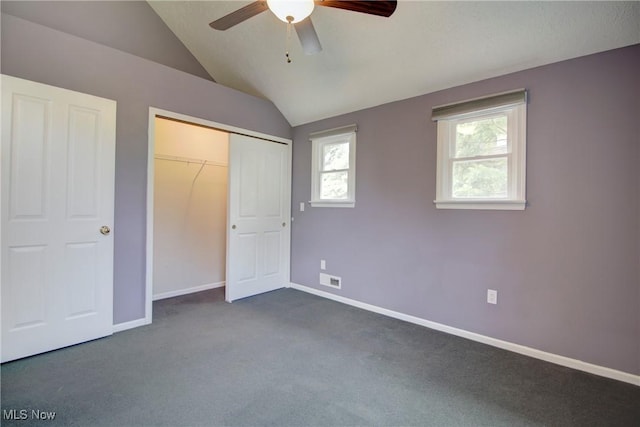 181 Seminary St, Berea, OH 44017 - unfurnished bedroom with lofted ceiling, dark carpet, a closet, and a ceiling fan
