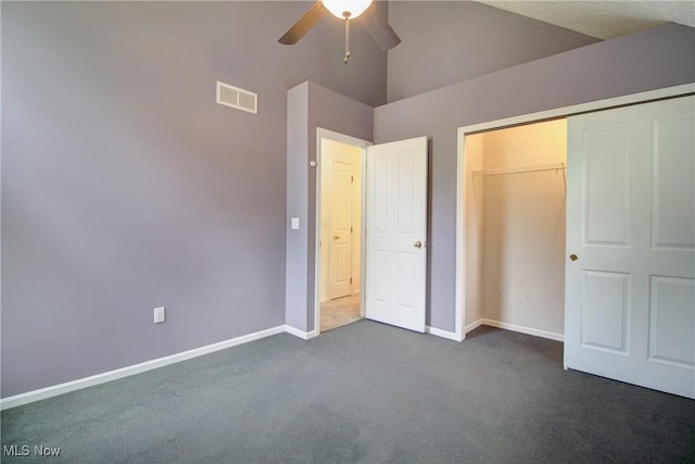 181 Seminary St, Berea, OH 44017 - unfurnished bedroom featuring dark carpet, a closet, ceiling fan, and high vaulted ceiling