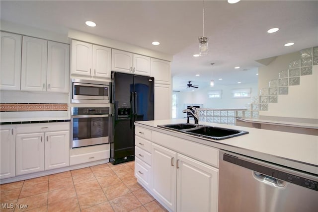 181 Seminary St, Berea, OH 44017 - kitchen featuring stainless steel appliances, recessed lighting, light countertops, white cabinets, and ceiling fan