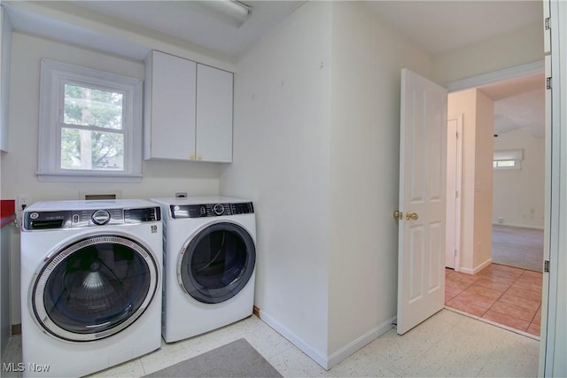 181 Seminary St, Berea, OH 44017 - washroom with cabinet space, washer and dryer, and light flooring