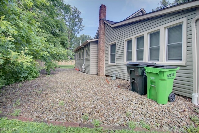 181 Seminary St, Berea, OH 44017 - view of home's exterior featuring a chimney