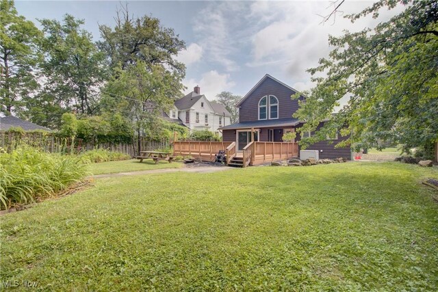 181 Seminary St, Berea, OH 44017 - view of grassy yard with a wooden deck