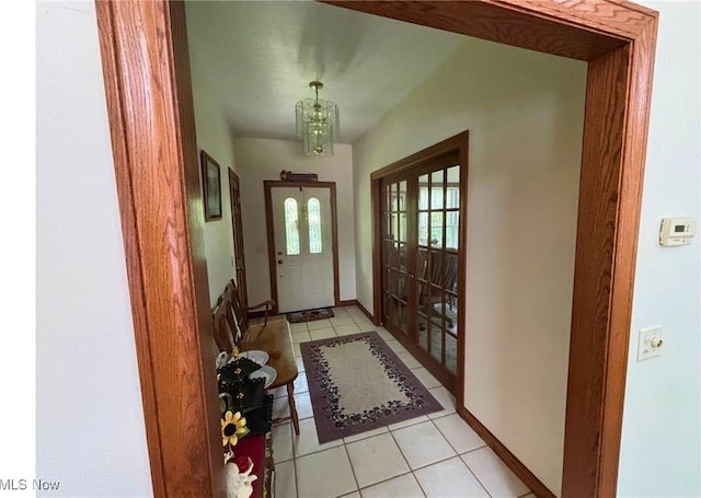 611 Wainwright Rd SE, New Philadelphia, OH 44663 - entrance foyer with light tile patterned floors and baseboards