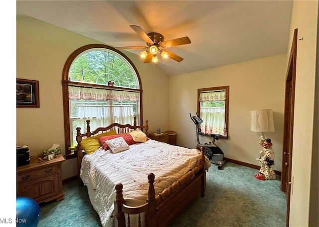 611 Wainwright Rd SE, New Philadelphia, OH 44663 - bedroom featuring carpet floors, lofted ceiling, multiple windows, and ceiling fan