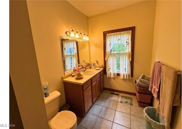 611 Wainwright Rd SE, New Philadelphia, OH 44663 - bathroom with vanity and tile patterned flooring