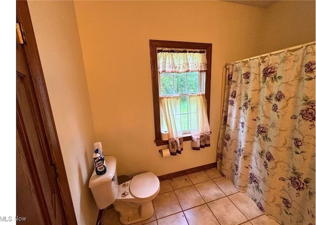 611 Wainwright Rd SE, New Philadelphia, OH 44663 - bathroom featuring tile patterned floors and a shower with shower curtain