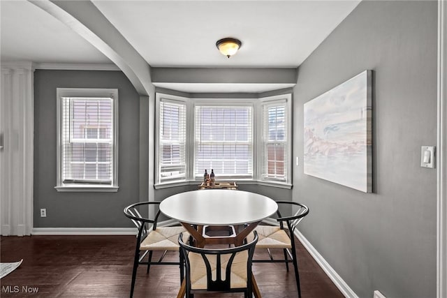 2324 Scholl Rd, University Heights, OH 44118 - dining space with dark wood-style floors and plenty of natural light