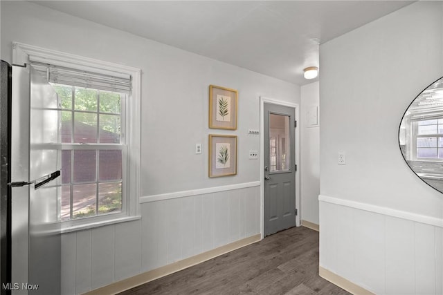 2324 Scholl Rd, University Heights, OH 44118 - spare room featuring wainscoting and wood finished floors