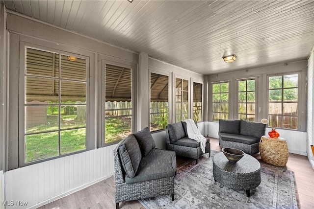 2324 Scholl Rd, University Heights, OH 44118 - sunroom with wood finished floors, an outdoor hangout area, and french doors