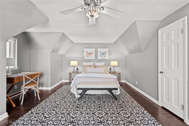 2324 Scholl Rd, University Heights, OH 44118 - bedroom featuring wood finished floors, a textured ceiling, lofted ceiling, and ceiling fan