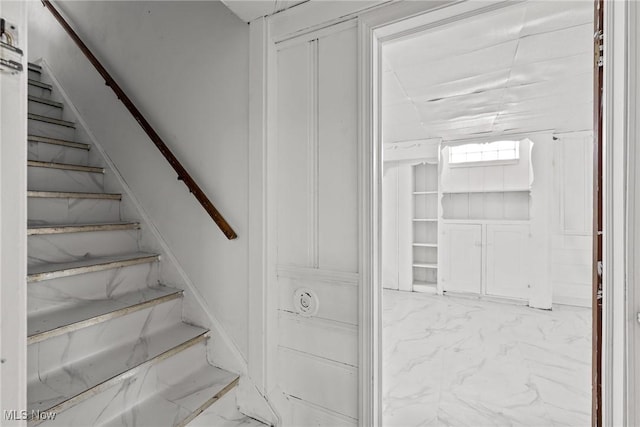 2324 Scholl Rd, University Heights, OH 44118 - stairs featuring marble look tiles