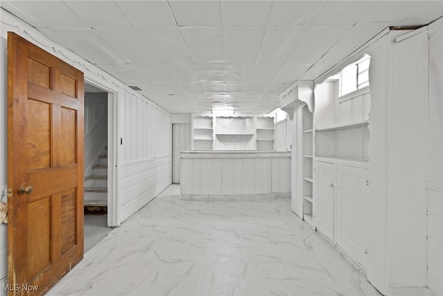 2324 Scholl Rd, University Heights, OH 44118 - finished below grade area with stairway and light marble finish flooring
