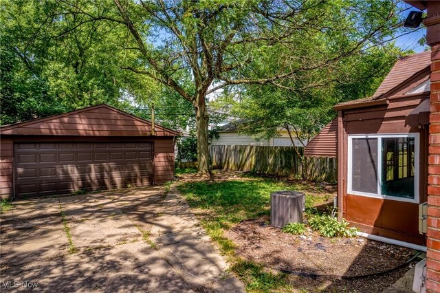 2324 Scholl Rd, University Heights, OH 44118 - view of yard featuring a garage and an outbuilding