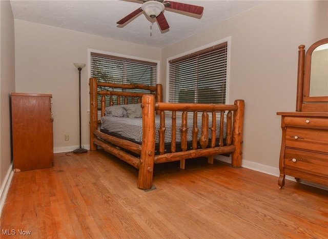 1212 State Route 7 NE, Brookfield, OH 44403 - bedroom featuring light wood-style flooring and ceiling fan
