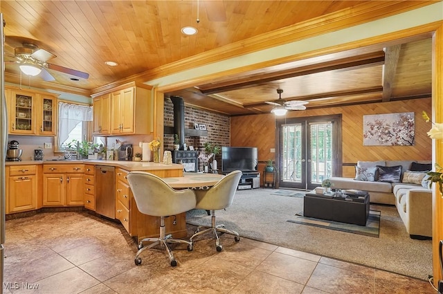 2970 Meadow Ln, Youngstown, OH 44511 - kitchen featuring a wood stove, a wood ceiling with exposed beams, a ceiling fan, open floor plan, and dishwasher