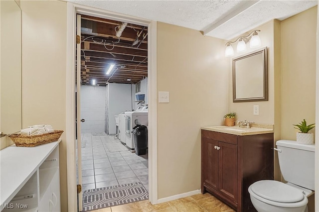 2970 Meadow Ln, Youngstown, OH 44511 - full bath with washing machine and clothes dryer, vanity, and tile patterned flooring