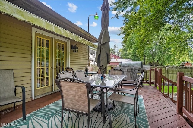 2970 Meadow Ln, Youngstown, OH 44511 - wooden terrace with outdoor dining space