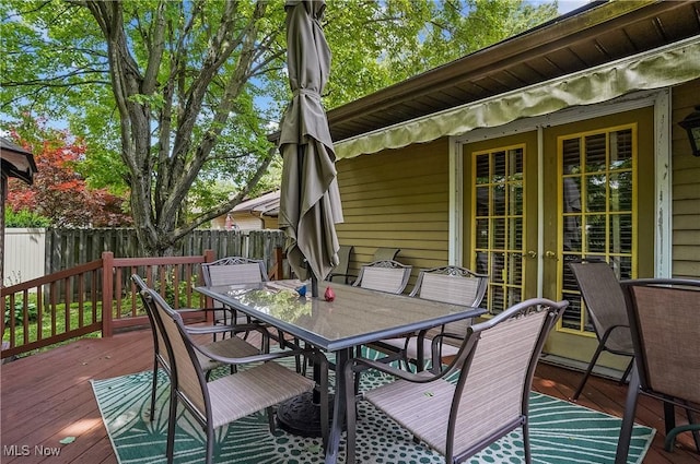 2970 Meadow Ln, Youngstown, OH 44511 - wooden deck with outdoor dining space and french doors