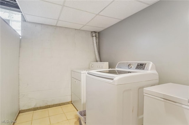 13774 Smith Goshen Rd, Beloit, OH 44609 - laundry room with washer and clothes dryer and concrete block wall