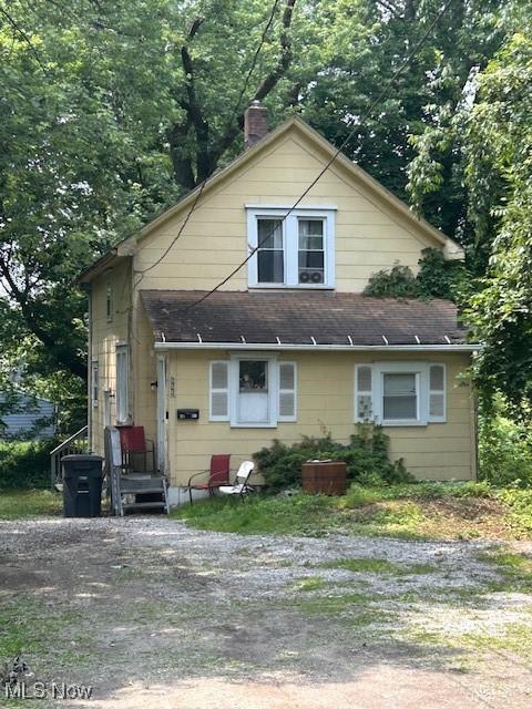 656 Kling St Unit 2, Akron, OH 44311 - bungalow-style home with a chimney and roof with shingles
