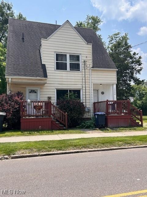 40-42 Uhler Ave, Akron, OH 44310 - traditional-style home with roof with shingles, stairs, and a deck
