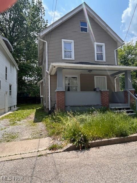294 Sumner Ct, Akron, OH 44311 - american foursquare style home featuring covered porch