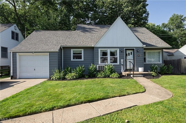 1819 49th St NW, Canton, OH 44709 - view of front of property with concrete driveway, a shingled roof, and an attached garage