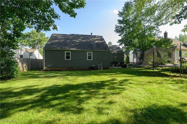 1819 49th St NW, Canton, OH 44709 - rear view of house featuring a trampoline