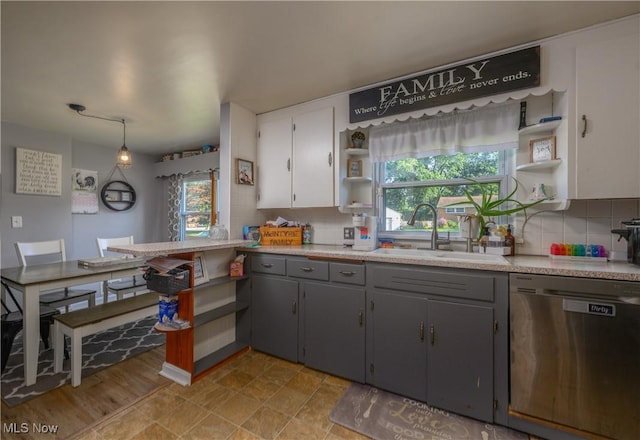 1819 49th St NW, Canton, OH 44709 - kitchen with dishwasher, open shelves, gray cabinetry, and healthy amount of natural light