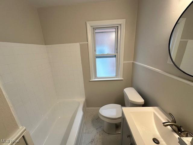 4206 Verona Rd, South Euclid, OH 44121 - full bath featuring a bath, vanity, and marble look tile flooring