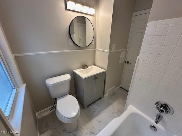 4206 Verona Rd, South Euclid, OH 44121 - bathroom featuring marble finish flooring, vanity, and shower / bath combination