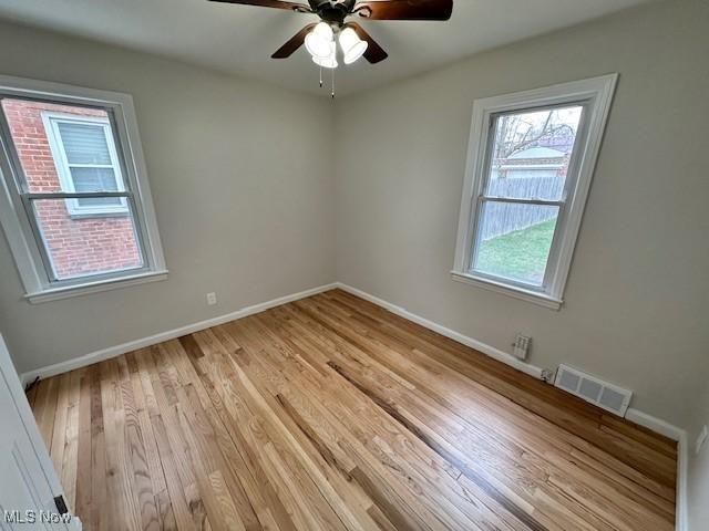 4206 Verona Rd, South Euclid, OH 44121 - spare room with light wood-style flooring and a ceiling fan